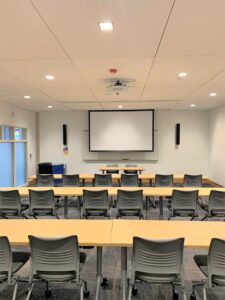 Room 101 with 3 rows of desks.