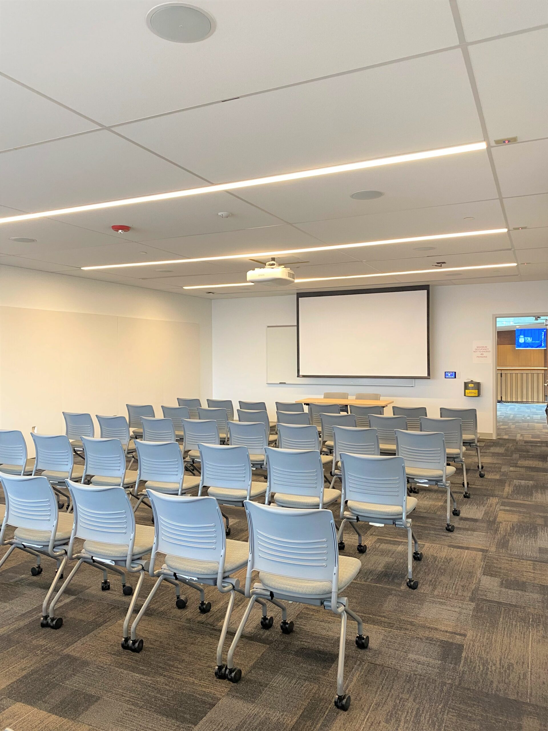 Room 224 with rows of chairs.
