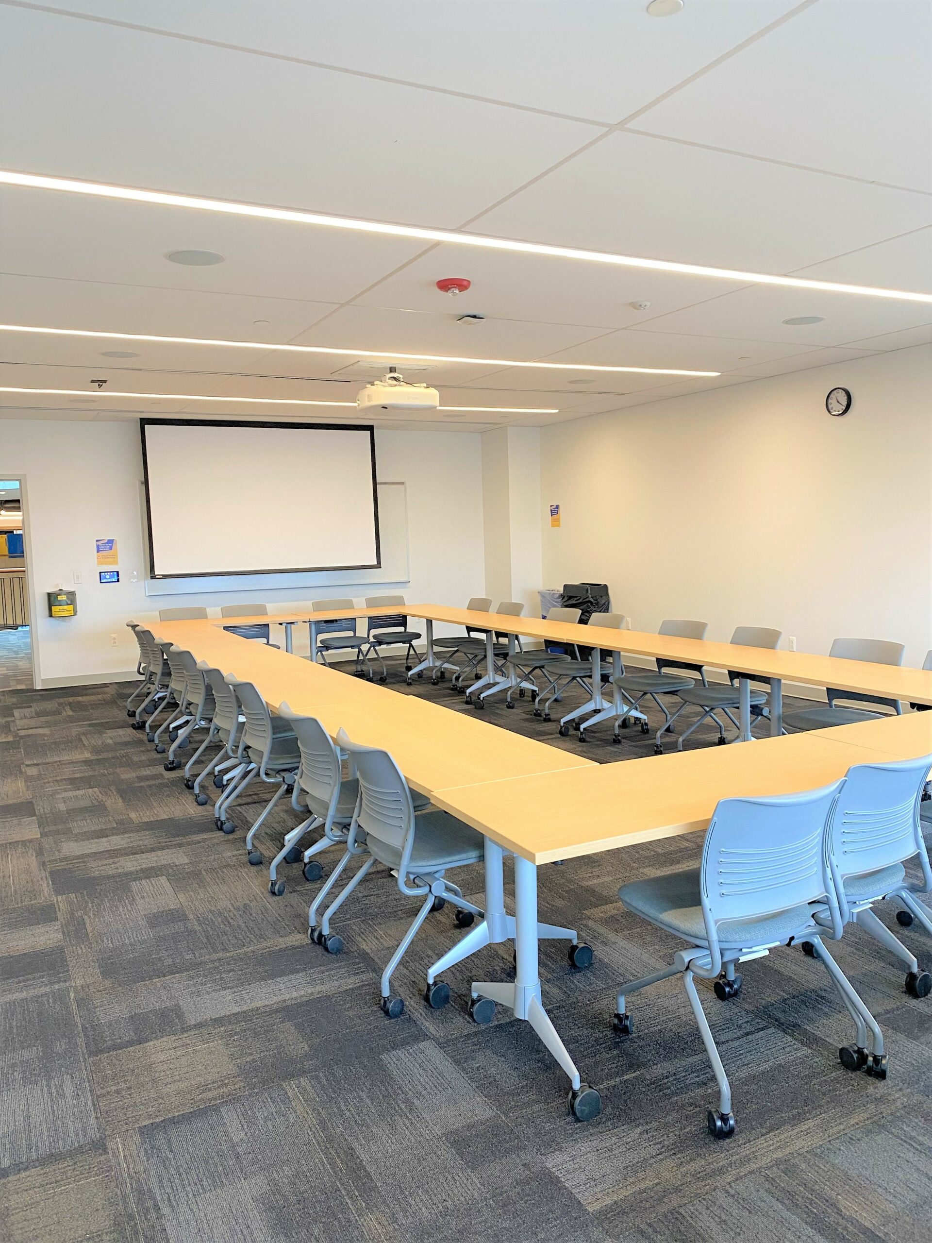 Room 222 with tables arranged into a rectangle.