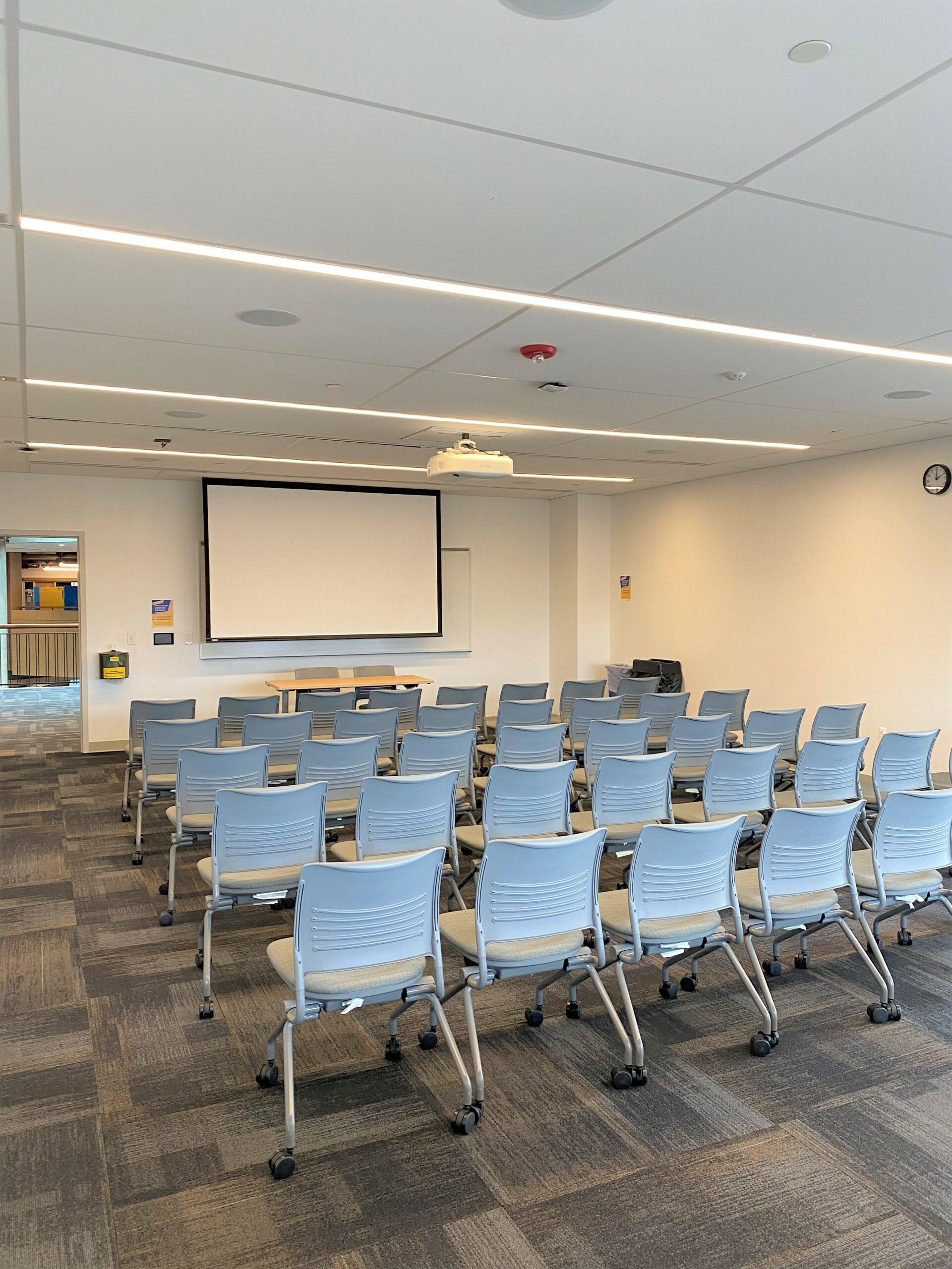 Room 222 with rows of chairs.